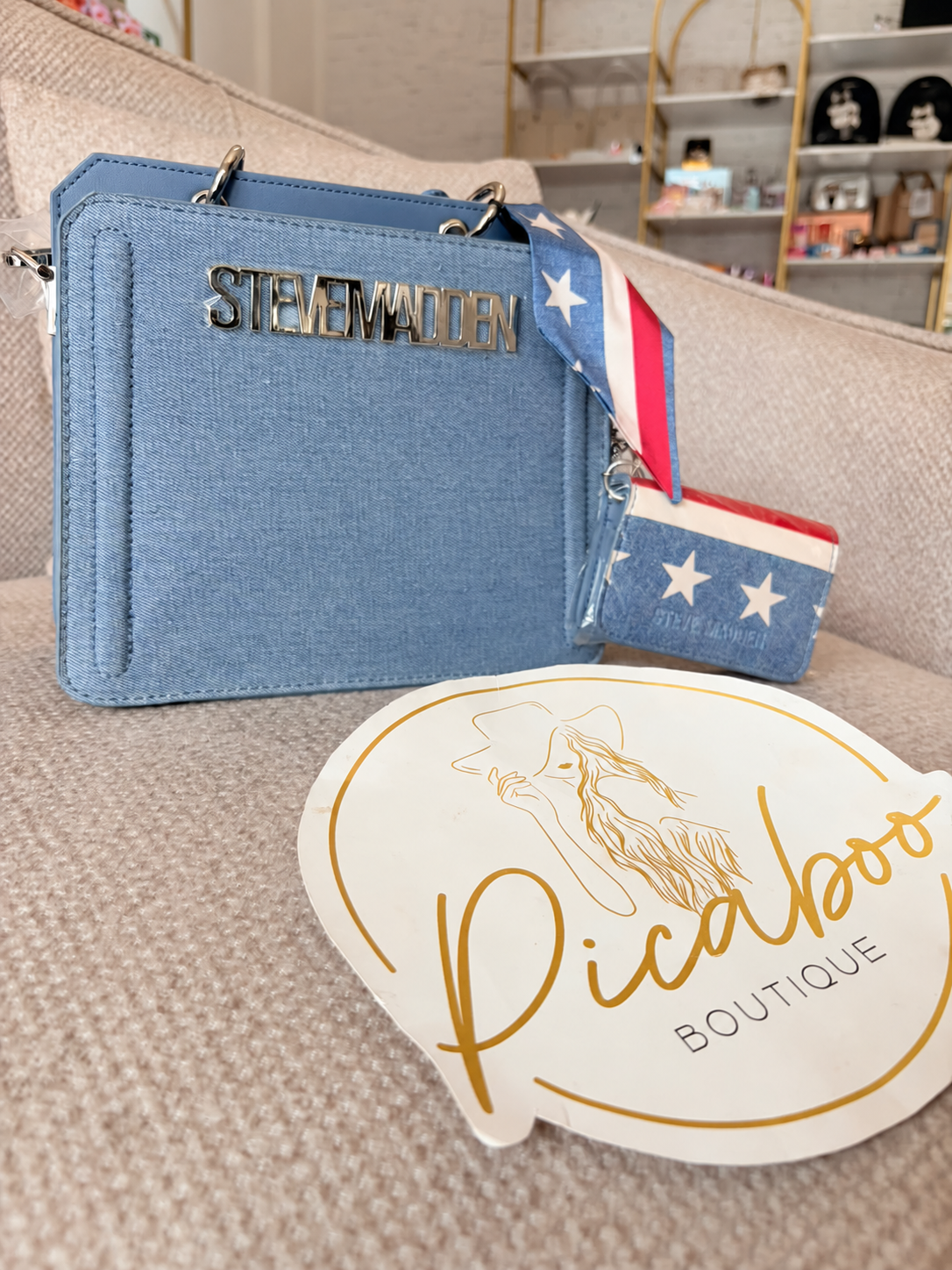 Bolsa Steve Madden de mezclilla azul con monedero