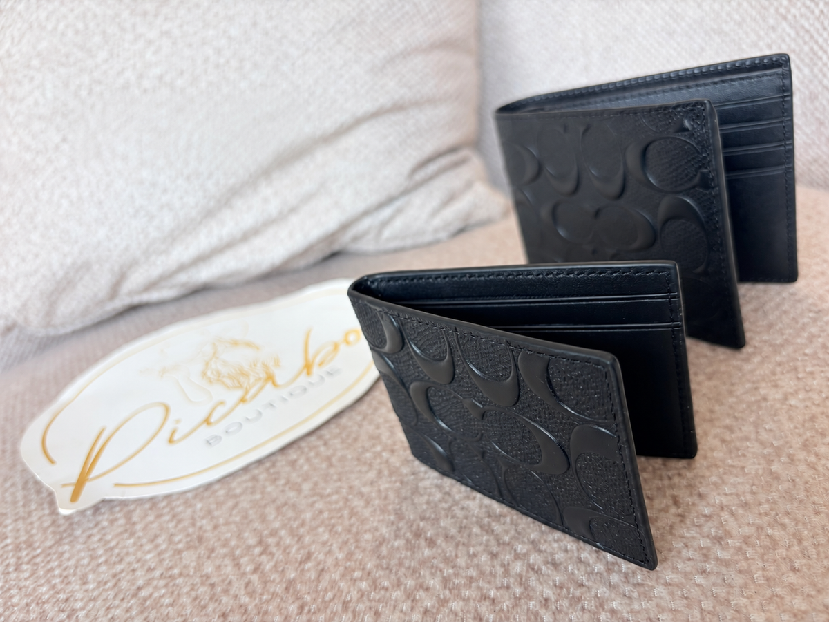 Cartera Coach negra para hombre