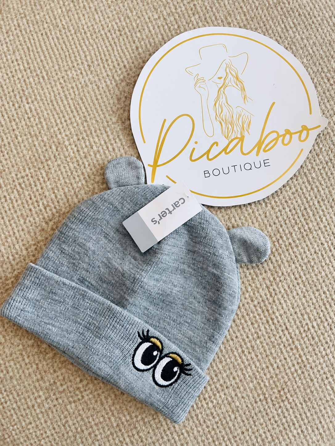Gorro Carter's gris con ojos bordados para niña