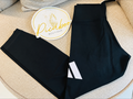 Leggings Adidas negros con logotipo blanco