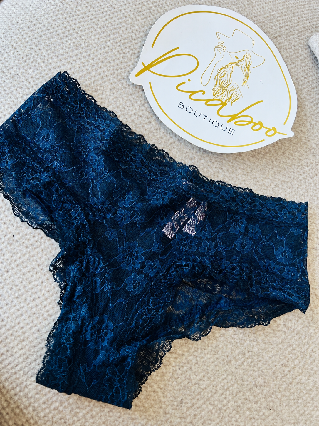 Panty de encaje floral azul marino talla M
