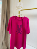Playera Psycho Bunny rosa con emblema frontal, talla XXL