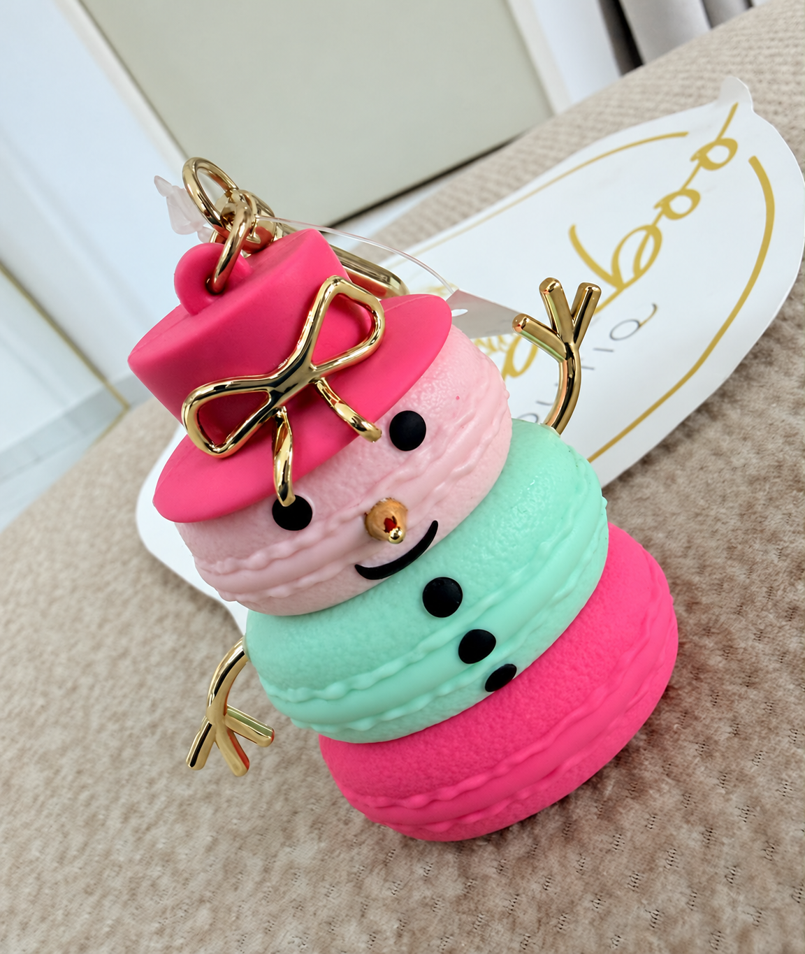 Porta gel muñeco de nieve de macarons
