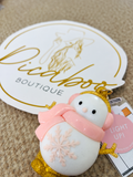 Porta gel pingüino rosa con luz