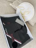 Set Michael Kors negro de gorro y bufanda