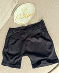 Short deportivo Gymshark negro con pretina cruzada