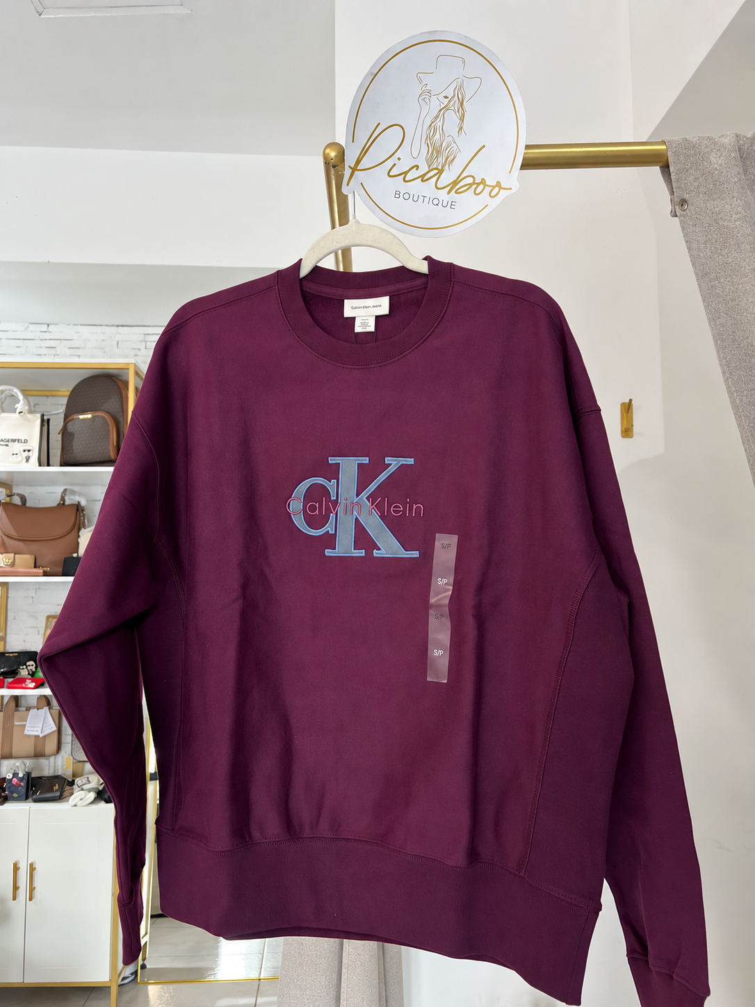 Sudadera Calvin Klein color vino talla S