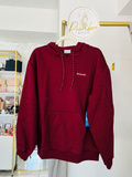 Sudadera Columbia color vino con capucha, corte amplio