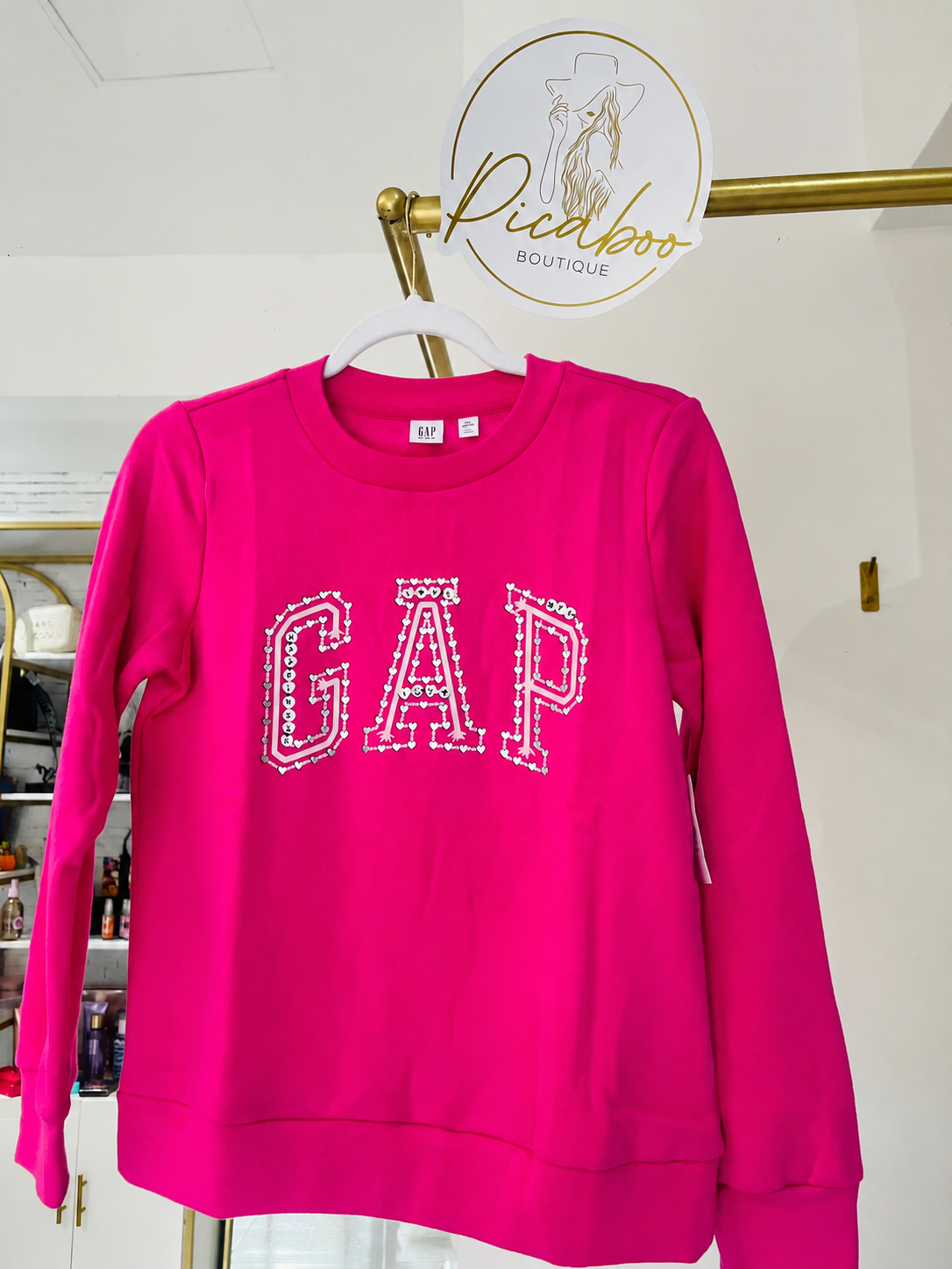 Sudadera GAP fucsia con letras de corazones para niña