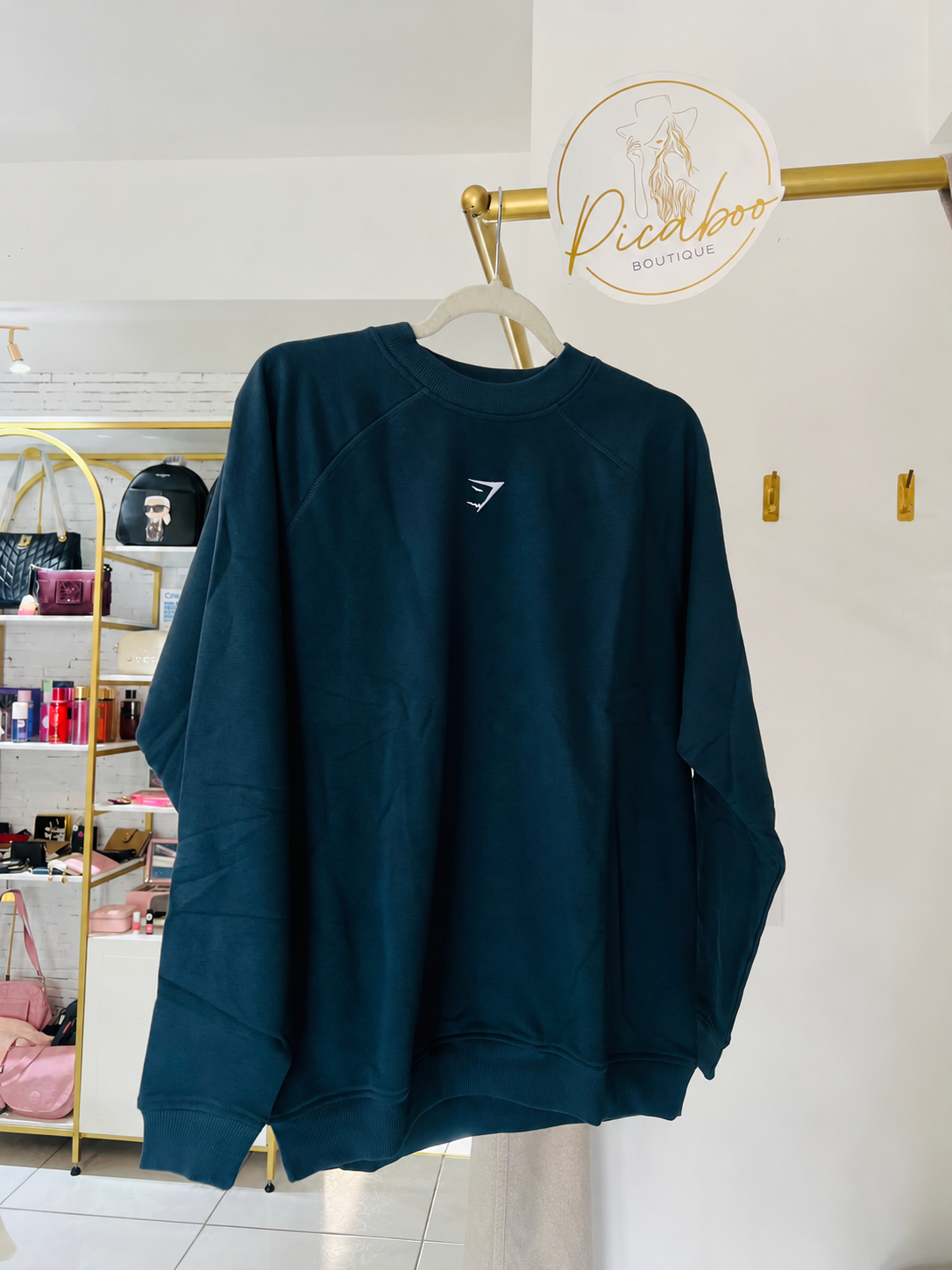 Sudadera Gymshark azul petróleo de cuello redondo