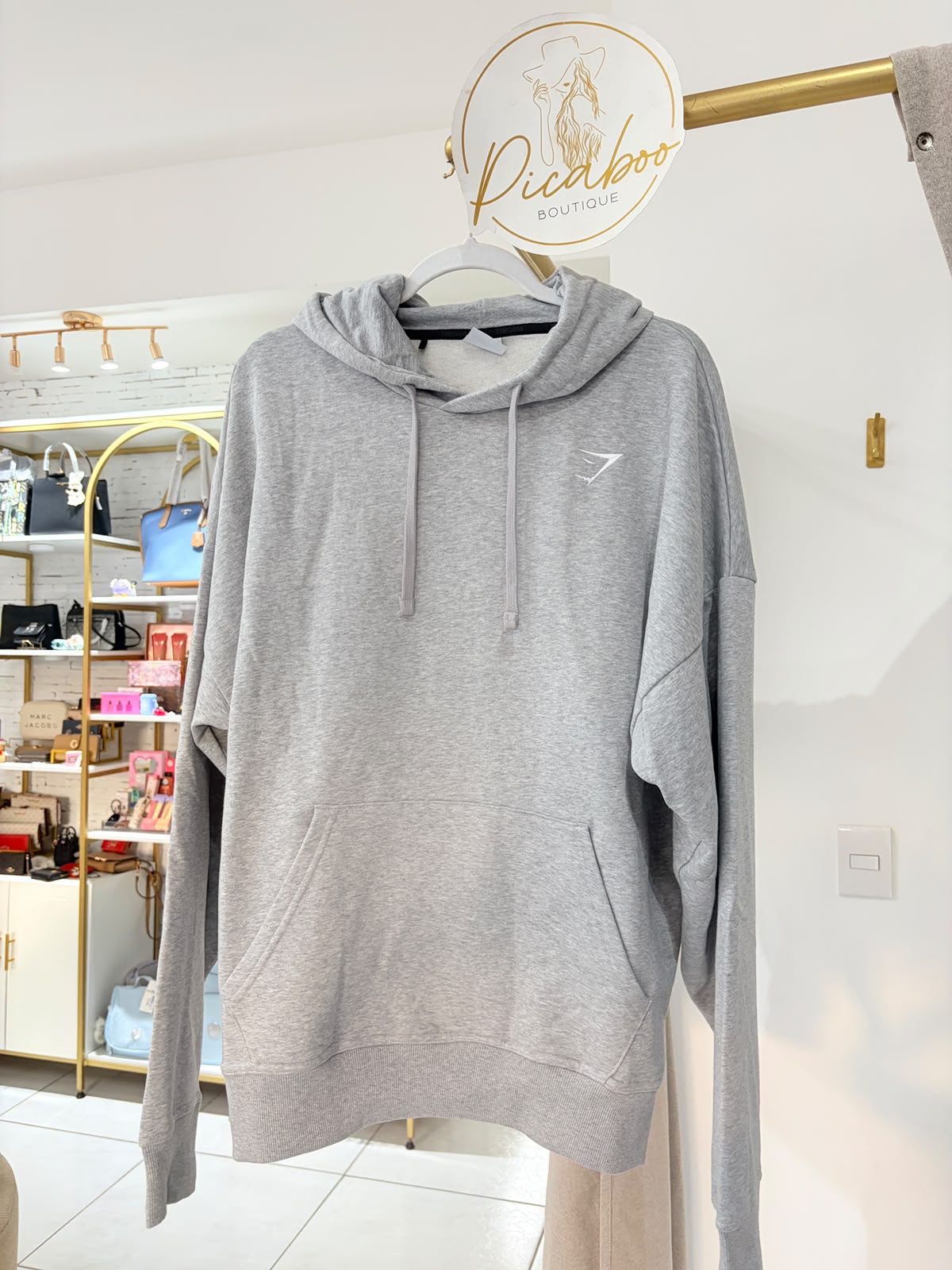 Sudadera Gymshark gris con capucha para caballero