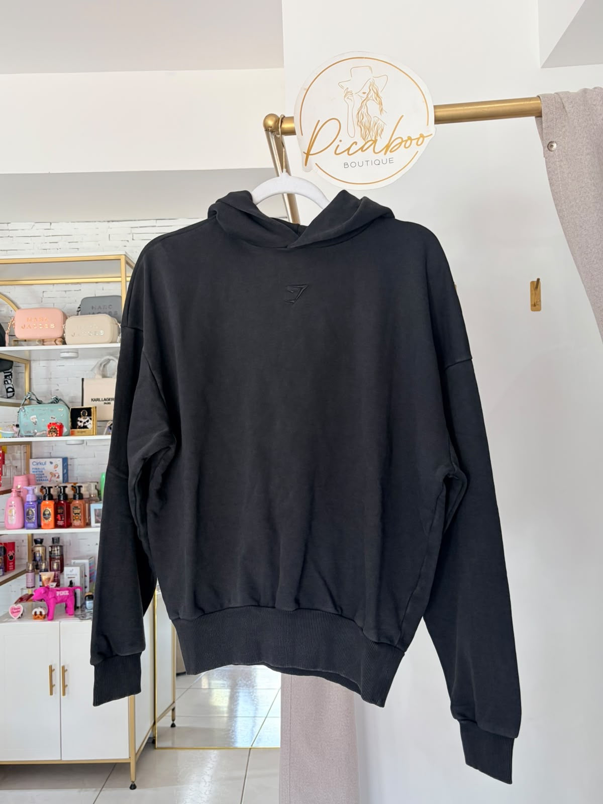 Sudadera Gymshark negra con capucha para dama, talla XS