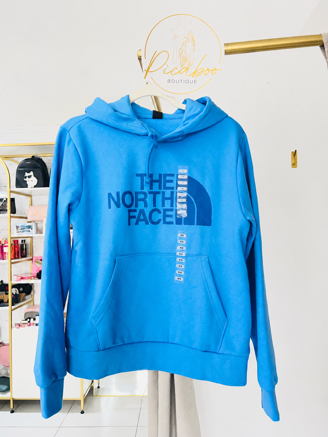 Sudadera The North Face azul con logotipo azul oscuro