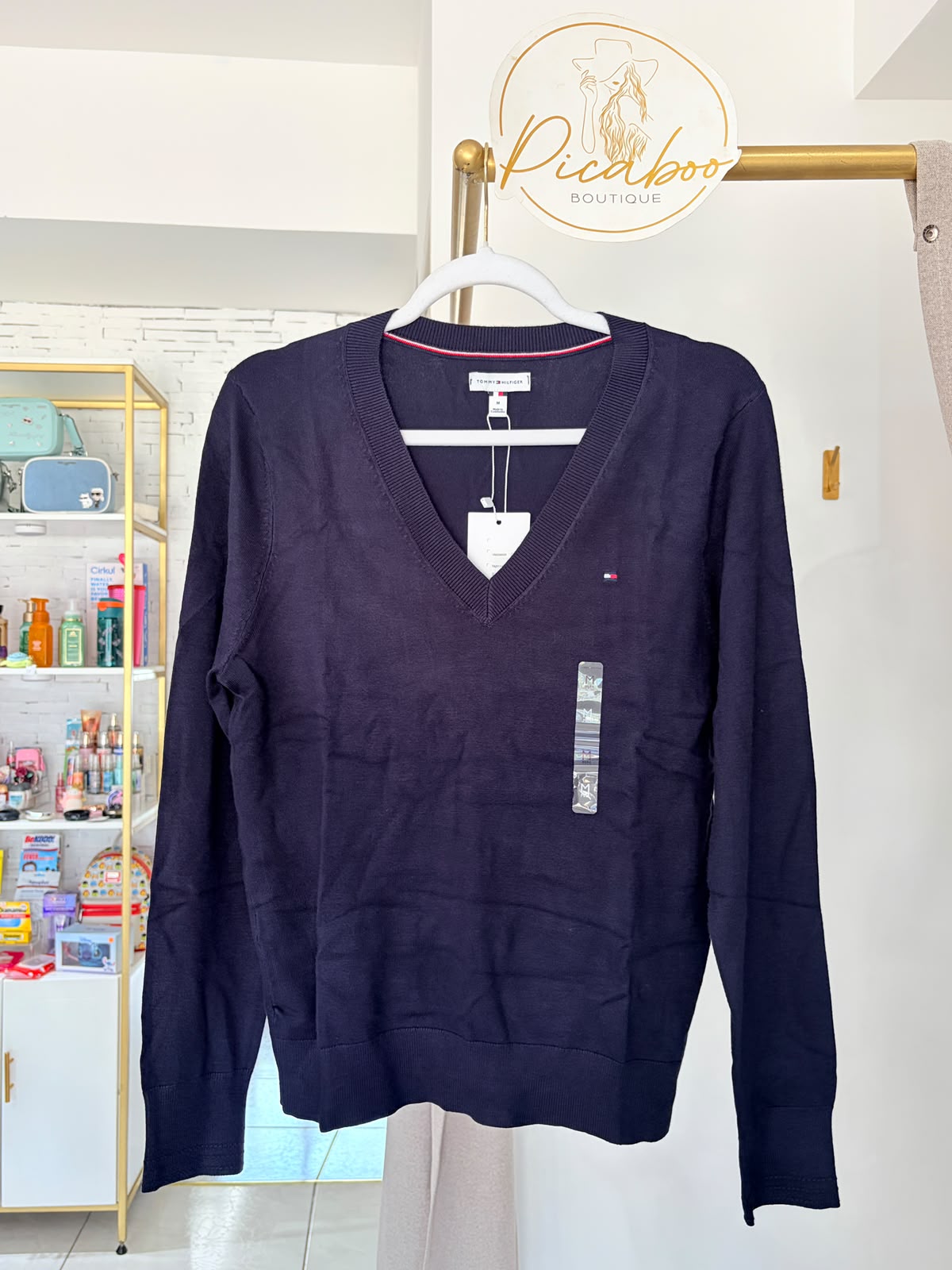 Suéter Tommy Hilfiger azul marino con cuello en V